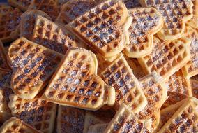 heart shaped waffles with icing sugar