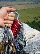 Climbing Ropes with carabiners in female hand