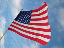 photo of American flag in the wind