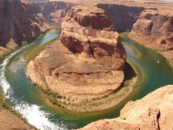 Horseshoe Bend is the amazingly beautiful rocky bend of the green Colorado River