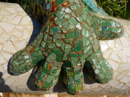 green paw, detail of sculpture in Park GÃ¼ell, spain, Barcelona