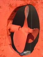 red ship propeller