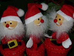 Beautiful red and white Santa Claus figures