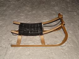 wooden sled in the snow