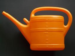 plastic orange watering can