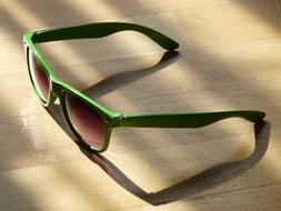 sunglasses with green frame