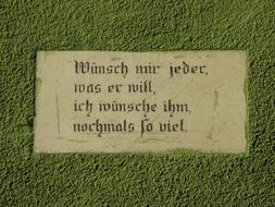 Pious Saying on wall