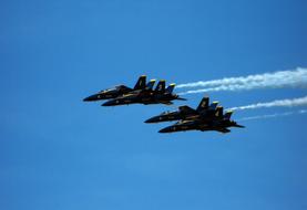 four fighters blue angels high in the sky