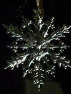 black and white photo of a decorative snowflake