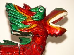 Beautiful green, red, orange and yellow Chinese dragon figure