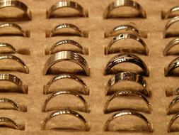 rings on a foam stand in the store