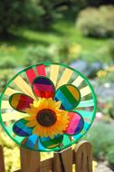 Pinwheel on fence, Rainbow colored Toy