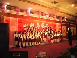 chinese children chorus singing on stage