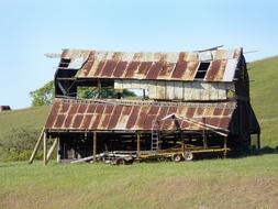 old barn with rusty roof