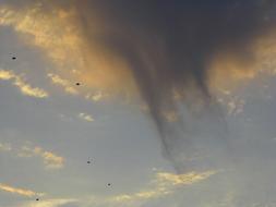 photo of rain clouds on a clear sky