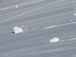 snowy boulders on the slope