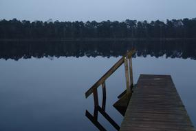pier on the lake in the evening