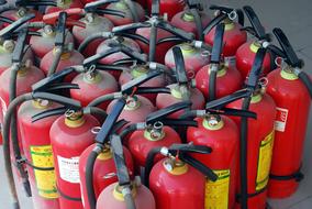 red fire extinguishers in stock