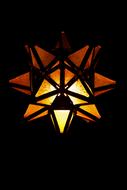 star shaped chandelier in the dark