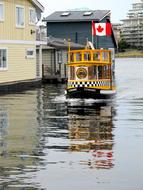 water taxi with the Canadian flag