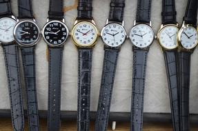 Wristwatches for men on stand