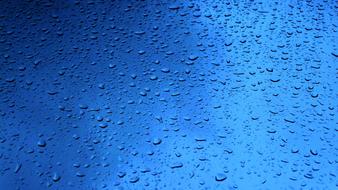 macro photo raindrops on glass