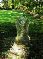 Tombstone Grave and green grass