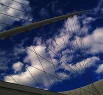 grid against a blue sky with allblaks
