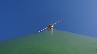 photo of the blades of a wind turbine bottom view