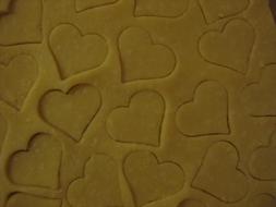 make homemade heart-shaped cookies