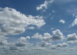 lot of fluffy Clouds at Blue Sky