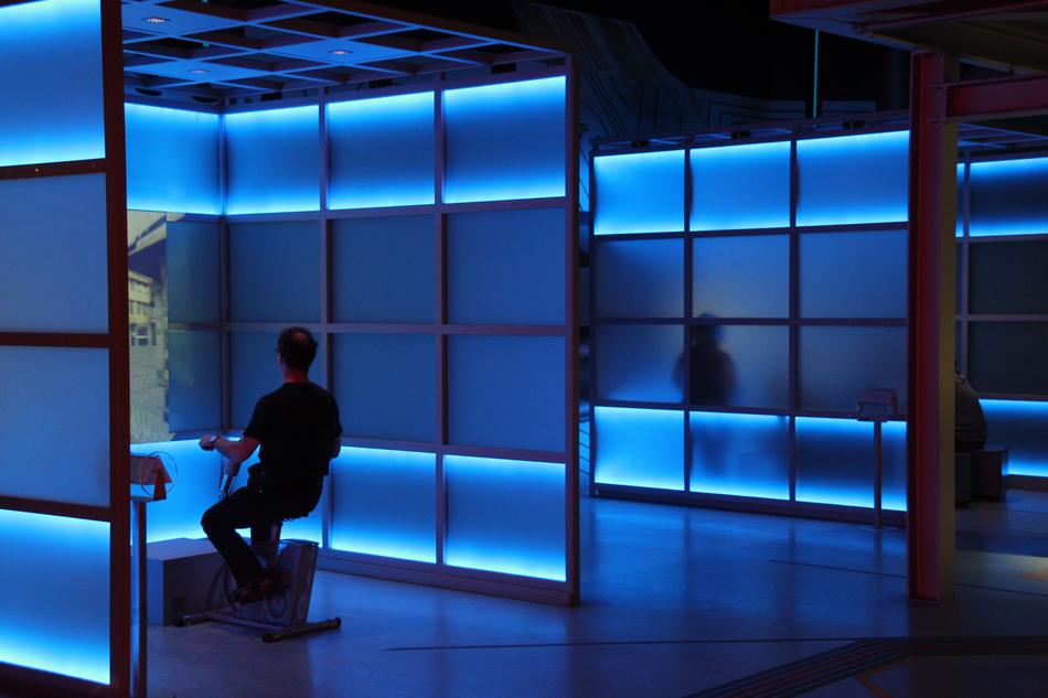 blue illumination of partitions in the room