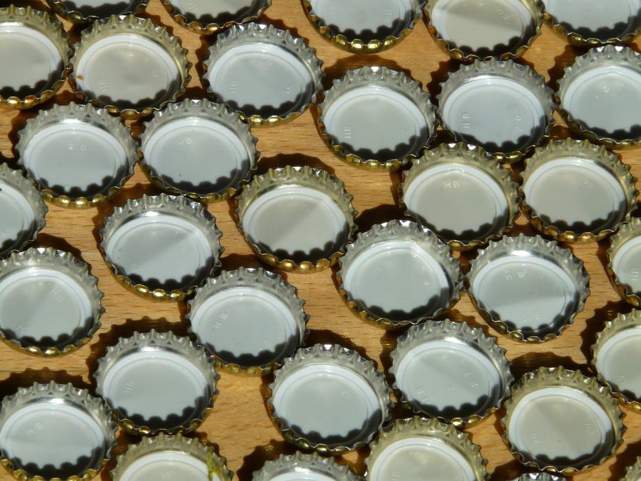 inverted bottle caps on the table