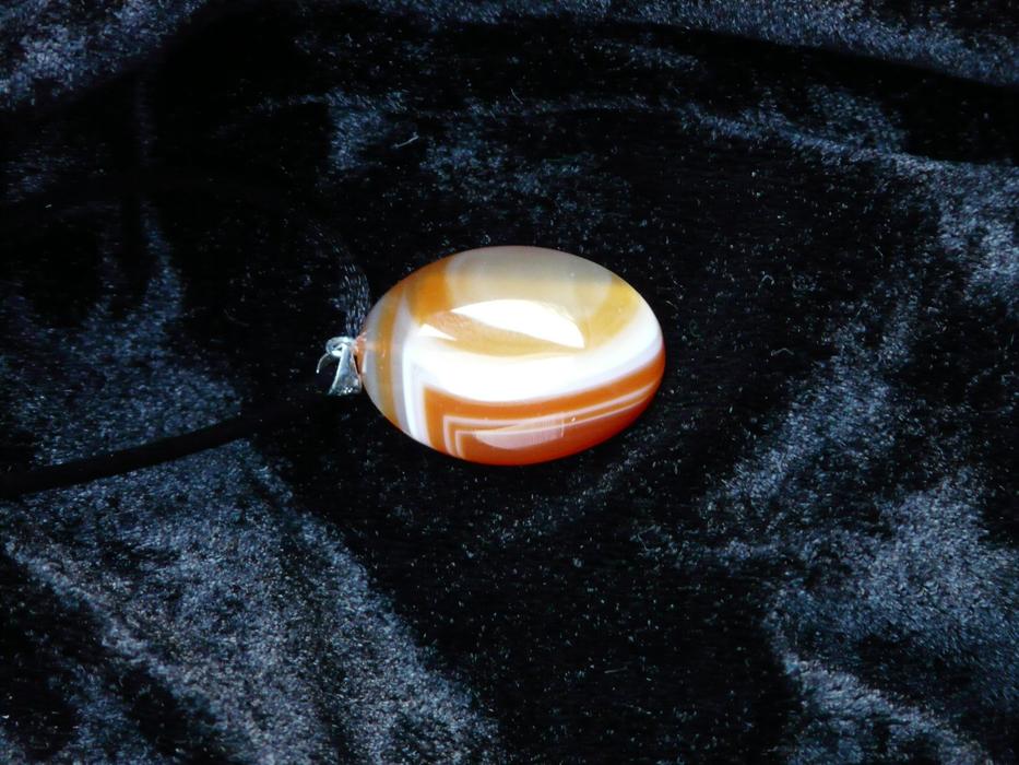 Gem Stone with Chain on black tissue
