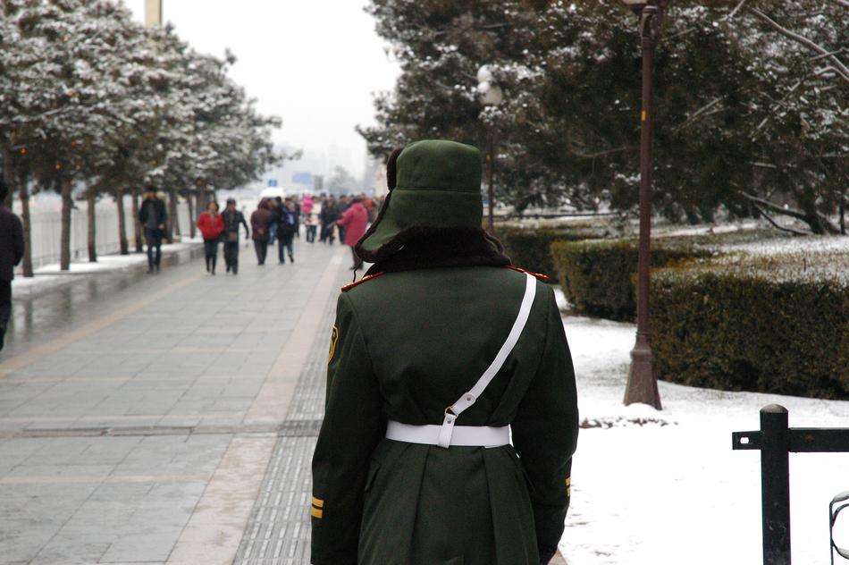 back view of Soldier in Winter uniform in city, china, beijing