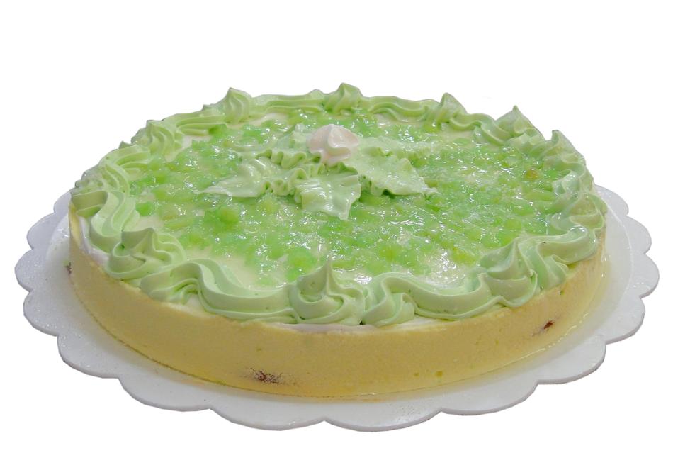 photo of a cake with green cream