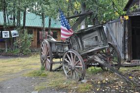 an old wooden cart on a farm in America