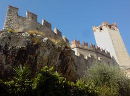 Wall of medieval Fortress at sky