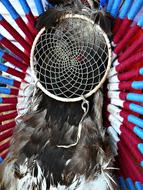 Dreamcatcher, native american souvenir with grey Feathers