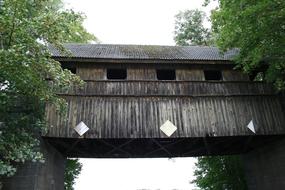 old Wooden covered Bridge at summer