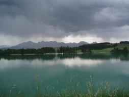 Storm clouds over the Forggensee lake