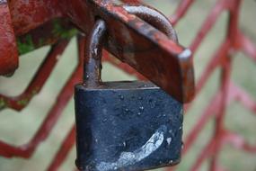 wet lock hanging on the gate