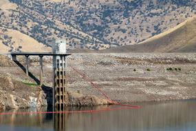 Pump on Water Reservoir, usa, california, Success lake on beautiful landscape