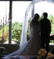 bride and groom at the altar