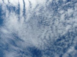 white clouds in the sky as background