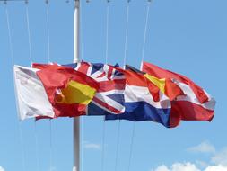 Flags Blow blue sky