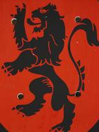 Black and red Coat of arms, with the lion, with the patterns