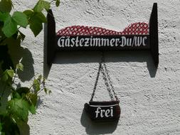 bed and breakfast as an advertisement on the wall