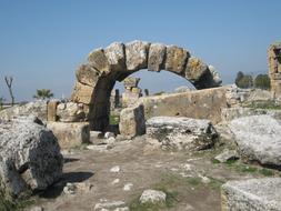 Antique stone gateway, arch, ruin