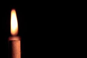 Close-up of the beautiful, burning sailing light, at black background